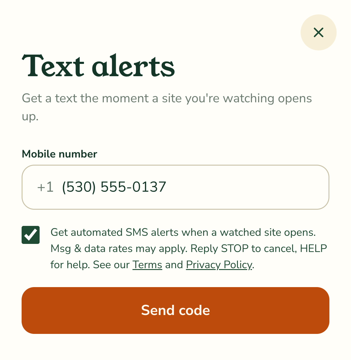 The Campatible text-alerts opt-in form, showing the mobile number field, the consent checkbox checked, the full disclosure with links to Terms and Privacy Policy, and the Send code button.